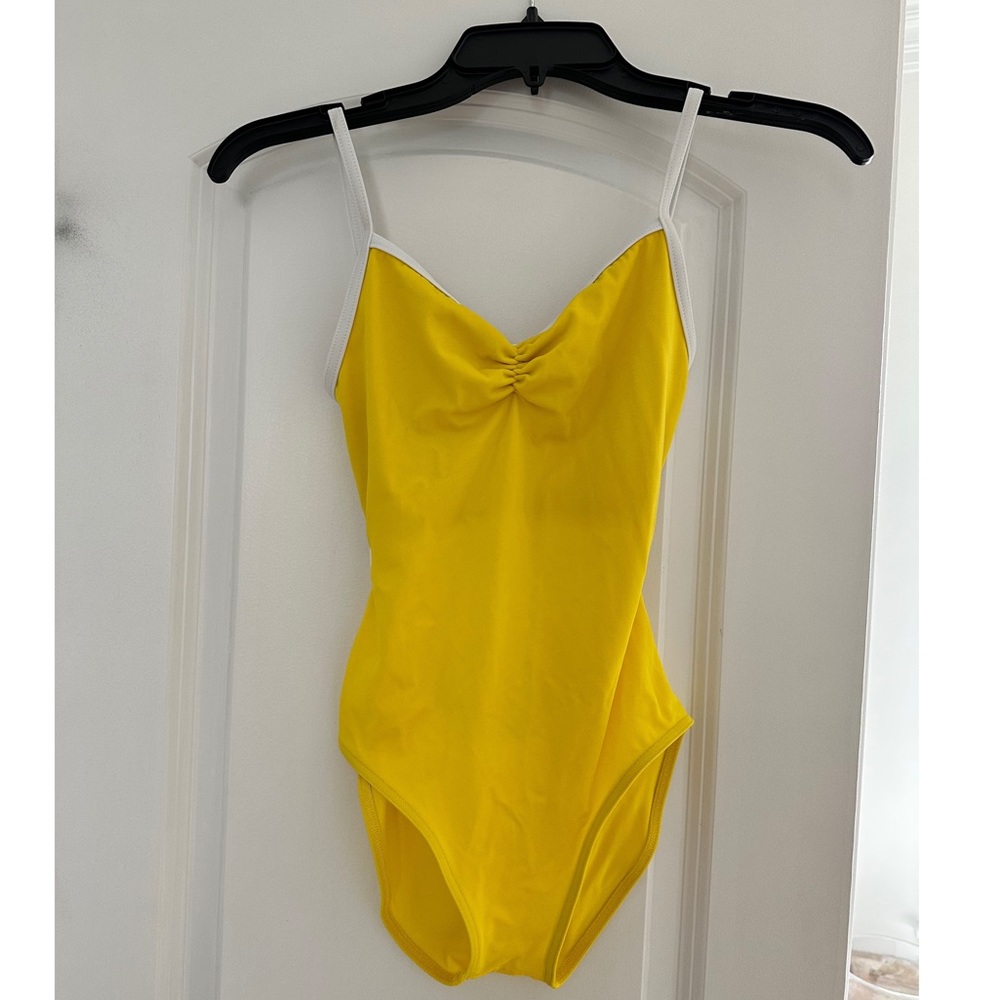 Yumiko leotard yellow with white trim. Size M. High leg.